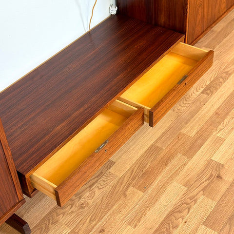 Wall unit /Shelving system in Santos rosewood, 1950s-60s, Sweden