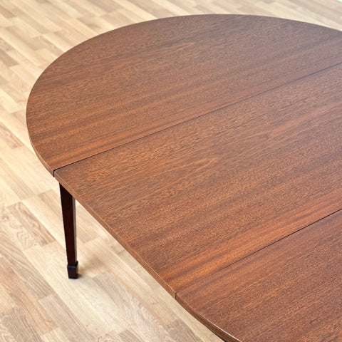 Round dining table with 1 ext in mahogany, 1950s-60s - Beyo Vintage
