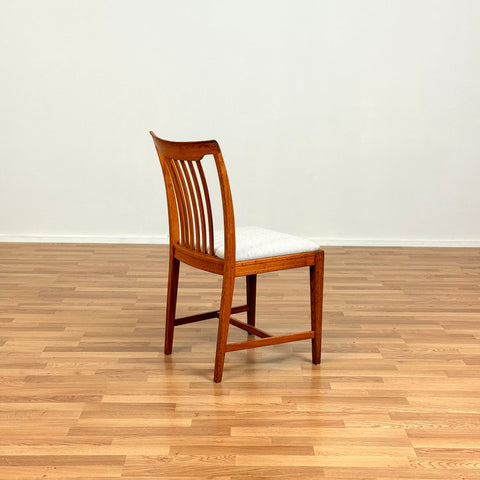 Dining chairs in walnut by Svante Skogh
