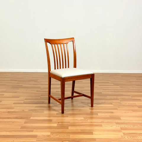 Dining chairs in walnut by Svante Skogh
