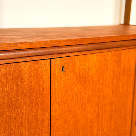 Bookshelf with pull-out desk in teak