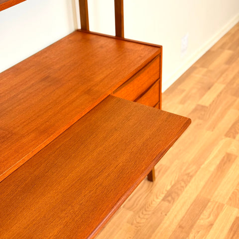 Bookshelf with pull-out desk in teak
