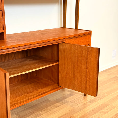 Bookshelf with pull-out desk in teak