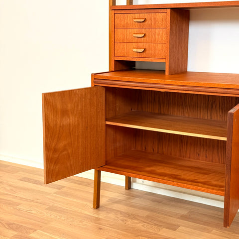 Bookshelf with pull-out desk in teak